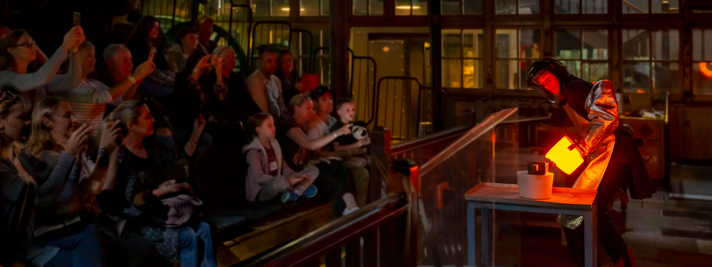 Crowd watches gold pour at The Perth Mint.